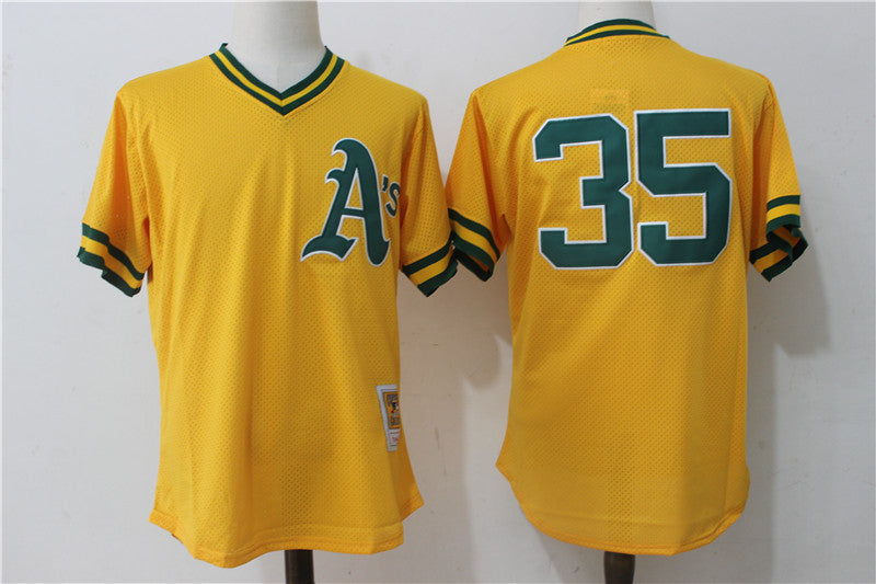 Rickey Henderson Oakland Athletics yellow Cooperstown jersey
